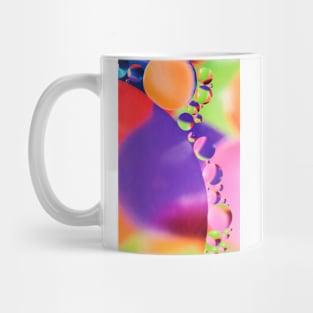 Colorful close up of oil drops in water Mug